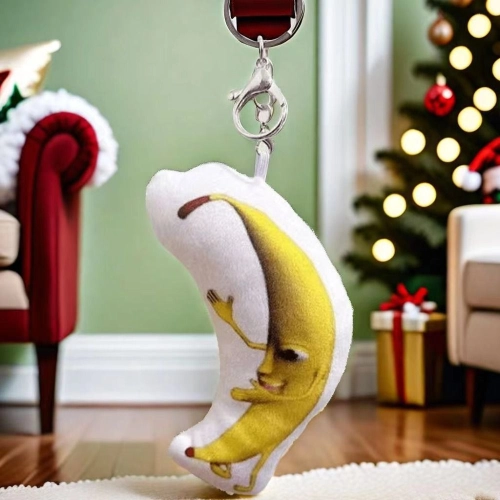 SUMPTUOUS พร้อมเพลงประกอบ พวงกุญแจเสียงกล้วยขนาดใหญ่ ตุ๊กตากล้วยสำหรับเด็ก ตลกๆ โซ่กุญแจกล้วย ของขวัญสำหรับเด็ก จี้ห้อยกระเป๋ากล้วยขนาดใหญ่โง่