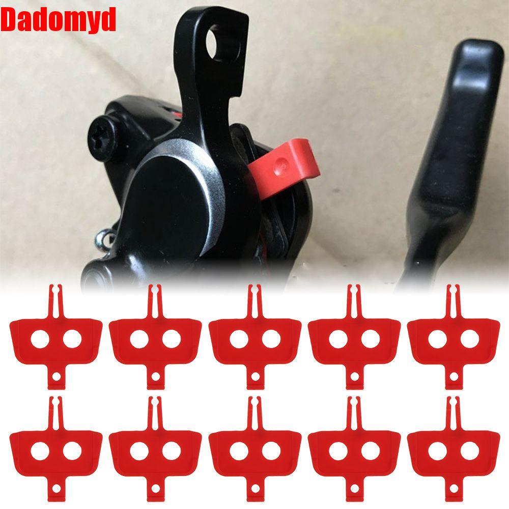 อุปกรณ์จักรยาน หมวกกันน็อค ไฟท้ายจักรยาน Dadomyd UWEARY 1/5pcs พลาสติก อะไหล่จักรยาน MTB กลางแจ้ง ตัวเว้นระยะเบรกจักรยาน Spacer Instert ดิสก์ไฮดรอลิก ผ้าเบรค ราคา 41 บาท*ส่งฟรี