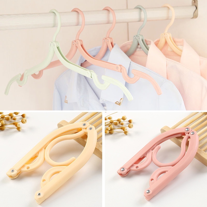 ไม้แขวนเสื้อพับได้ แบบพกพา มี 4 สี ไม้แขวนเสื้อพลาสติกพับได้ ไม้แขวนเสื้อกันลื่น ราคา  5 บาท*ส่งฟรี