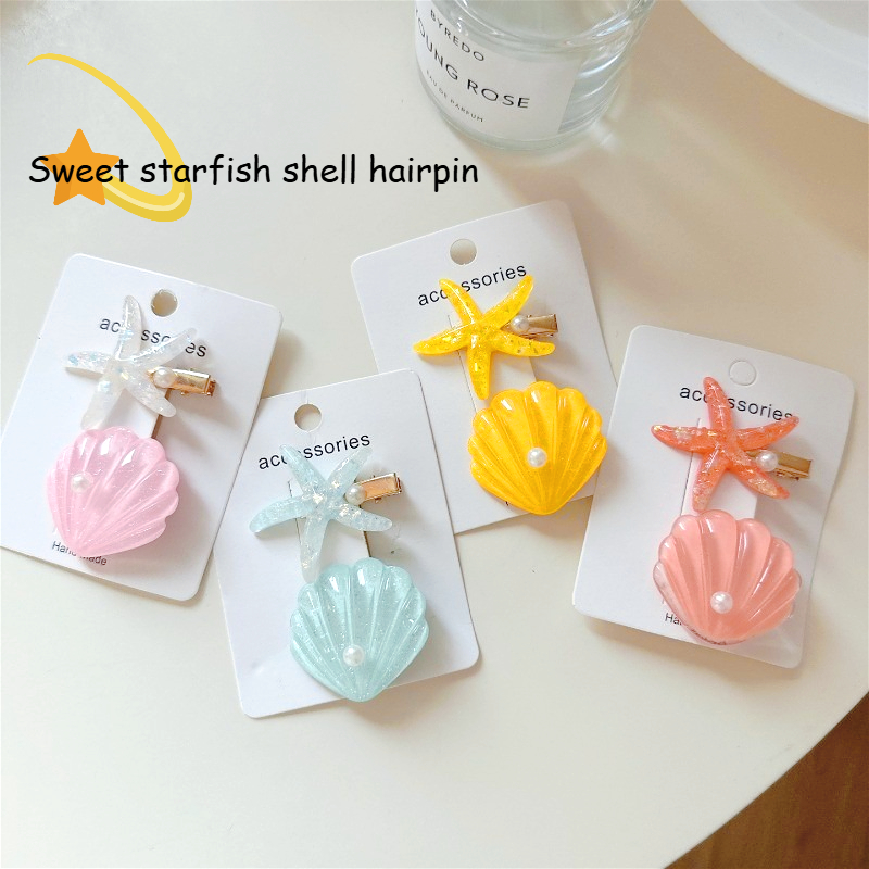 ชุดกิ๊บติดผมรูปปลาดาวสไตล์เกาหลี 2 ชิ้นสำหรับผู้หญิง เพื่อสร้างบรรยากาศวันหยุดพักผ่อนริมชายหาด ราคา 2 บาท*ส่งฟรี