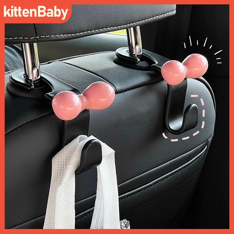 kittenBaby ตะขอด้านหลังเบาะรถสำหรับผู้หญิงสีชมพูพร้อมโบว์เก็บของภายในแบบไร้รอยต่อ ราคา 27 บาท*ส่งฟรี