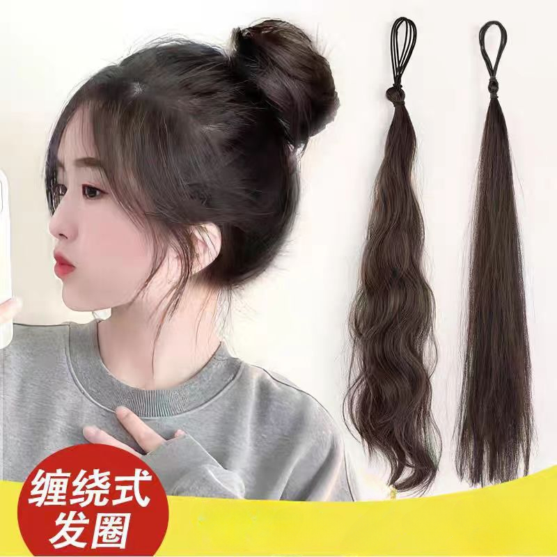 The wig has a loop that wraps around the bun head simulating fluffy lazy hair