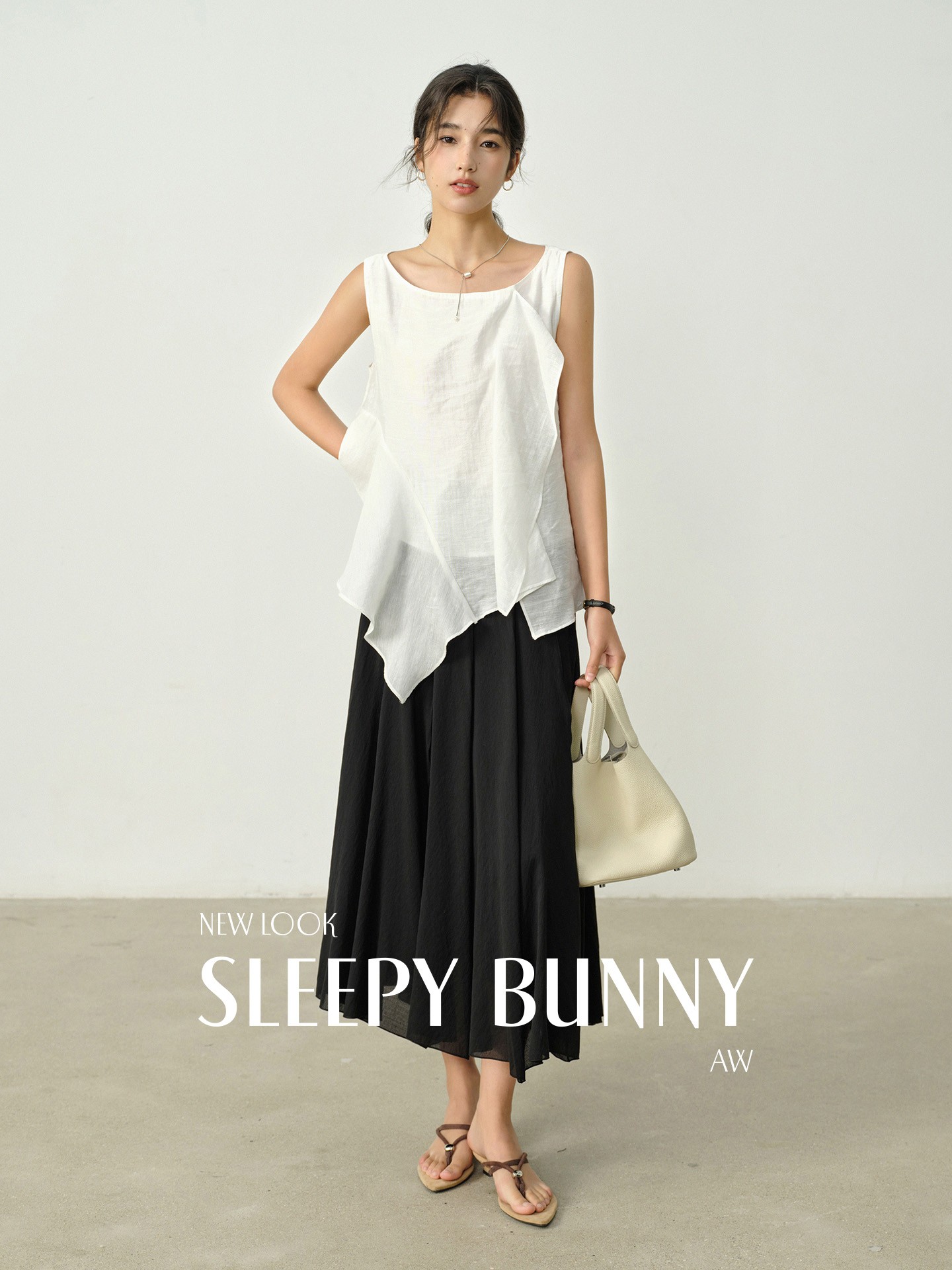 SLEEPY BUNNY Sleeveless Asymmetrical White Blouse for Women Summer Elegant Lyocell Acetate Loose Fit Top Lightweight Flowy Shirt Warm Weather ราคา 1,525 บาท*ส่งฟรี