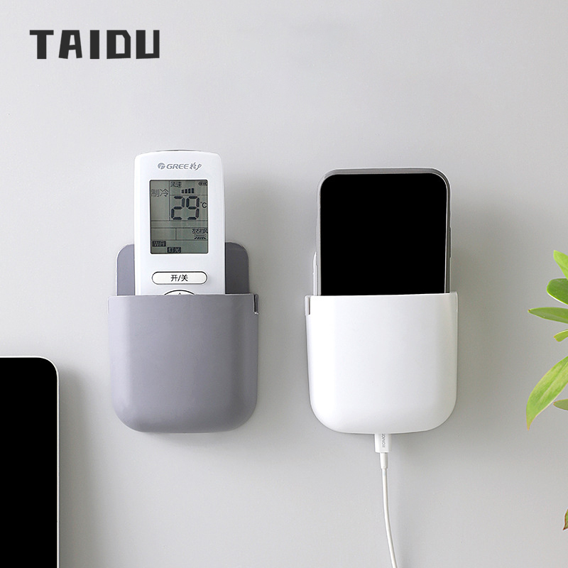 TV air conditioner remote control wall hanging box wall mounted storage box multi-function punch-free mobile phone storage rack ราคา 17 บาท*ส่งฟรี