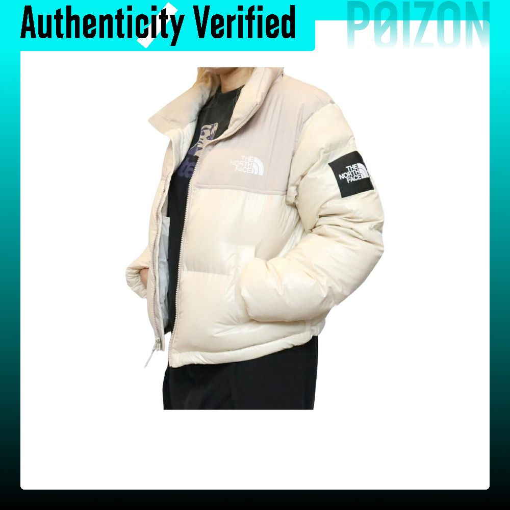 เสื้อแจ็คเก็ต เสื้อคลุมสตรี The North Face Nuptse Down s ผู้หญิงสีครีมคอตั้งหนา NJ1DQ85 คิว ราคา 32,883 บาท*ส่งฟรี
