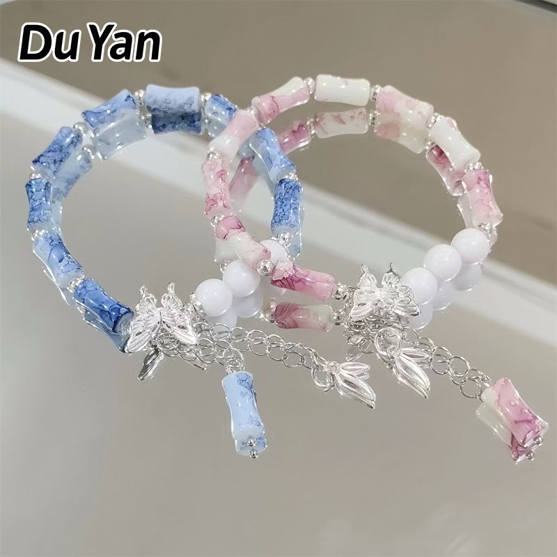 Du Yan Handcrafted Glass Bead Bracelet with Butterfly Charm and Natural Style ราคา 47 บาท*ส่งฟรี