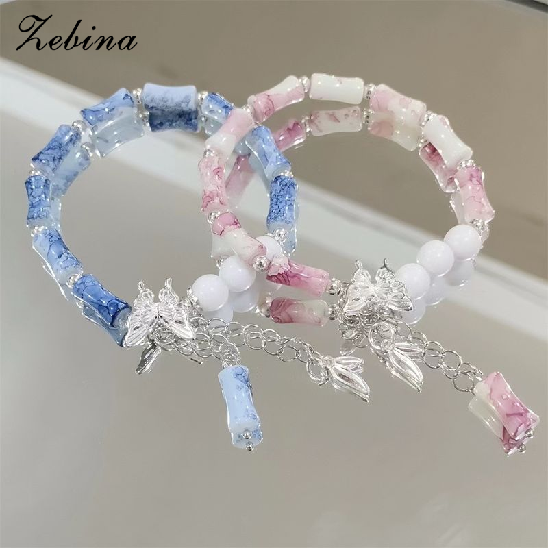 Zebina Handcrafted Glass Bead Bracelet with Butterfly Charm and Natural Style ราคา 47 บาท*ส่งฟรี