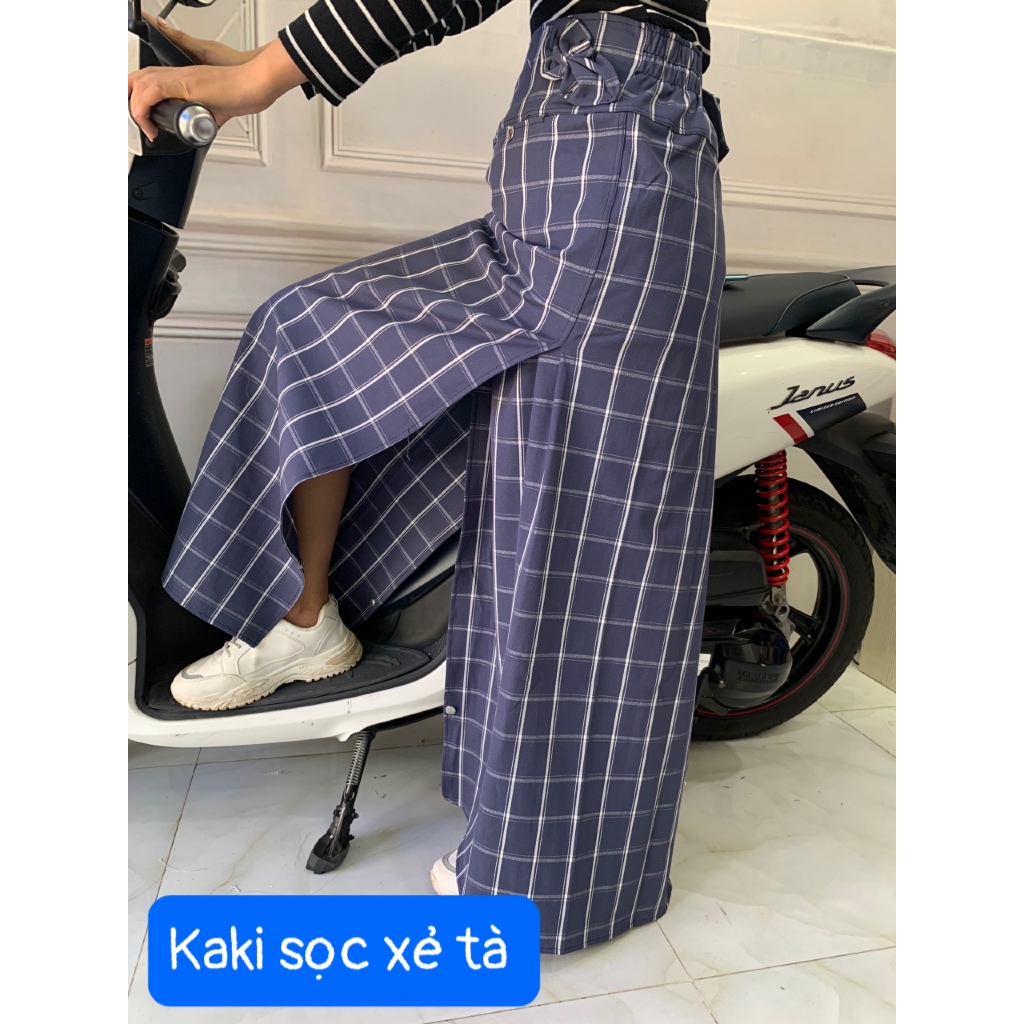 váy chống nắng xẻ Եà có túi phía trước cố định bằng miếng dán kết hợp nút bấm - dưới chân váy có nút bấm