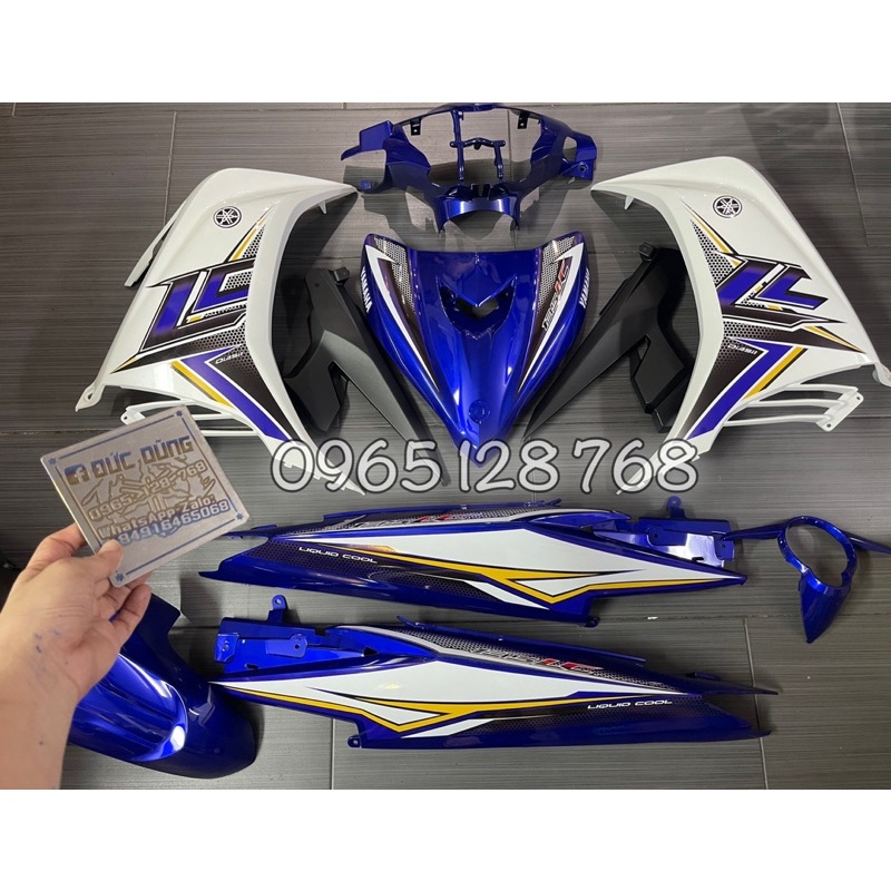 Dàn áo ex 135 trắng xanh tem lc