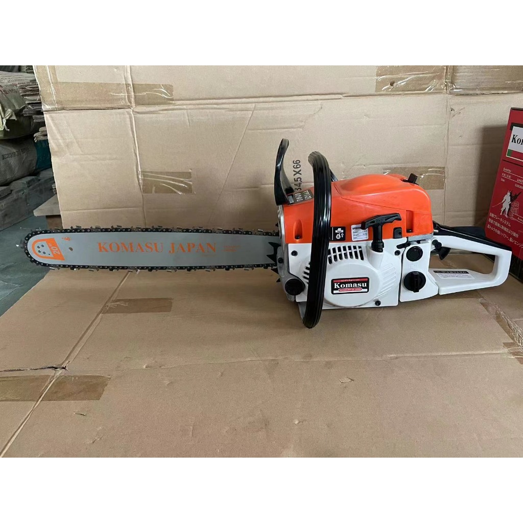 máy cưa xích chạy xăng komasu mẫu mới cải tiến lam dài 55cm bảo hành 12 tháng