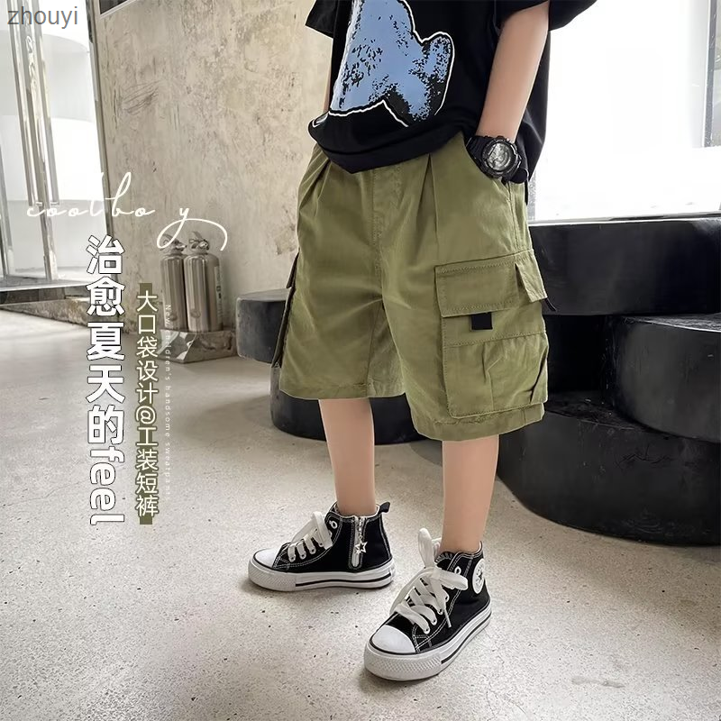 Boys' shorts in summer 2024, big boys' five piece pants explode on the street, children's workwear pants, children's mid pants trend zhouyi ราคา  483 บาท*ส่งฟรี
