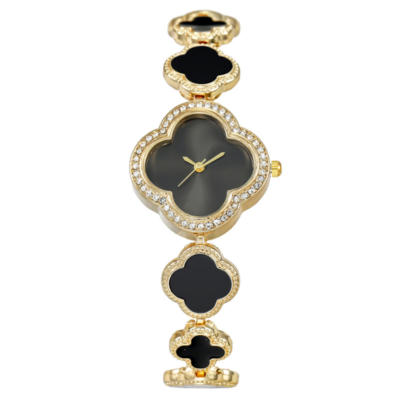 Đồng hồ dạng lắc tay Đồng hồ nữ Đồng hồ nữ cỏ bốn lá đơn giản thời trang