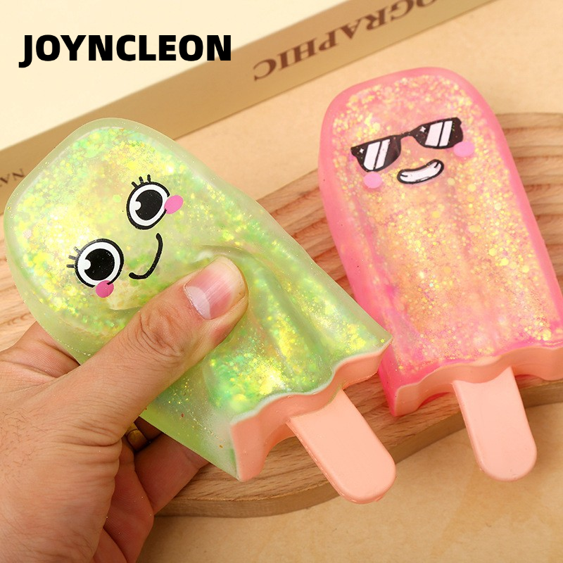 JOYNCLEON Squishy Popsicle Stress Relief Toy with Cute Faces and Glittery Texture - Slow Rebound Squishy Fun for Kids and Adults ราคา 83 บาท*ส่งฟรี