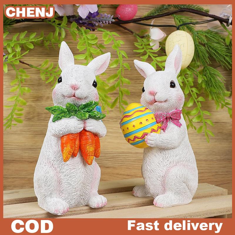CHENJ ของตกแต่งรูปกระต่ายอีสเตอร์รูปปั้นกระต่ายสีขาวทำจากเรซินแบบตั้งฤดูใบไม้ผลิของตกแต่งโต๊ะของขวัญงานเทศกาลสำหรับสวนบ้าน ราคา 169 บาท*ส่งฟรี