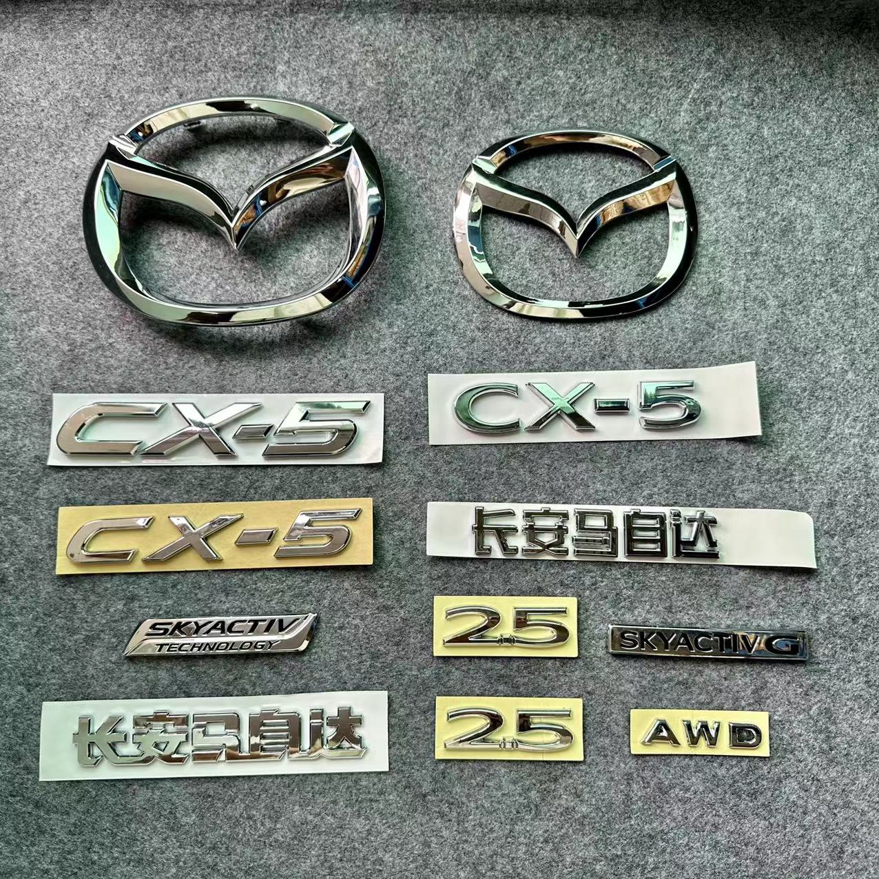 Áp dụng cho Mazda CX5 17-20 mô hình CX5, phía trước và phía sau logo, đuôi chữ logo, mạ điện logo vớ