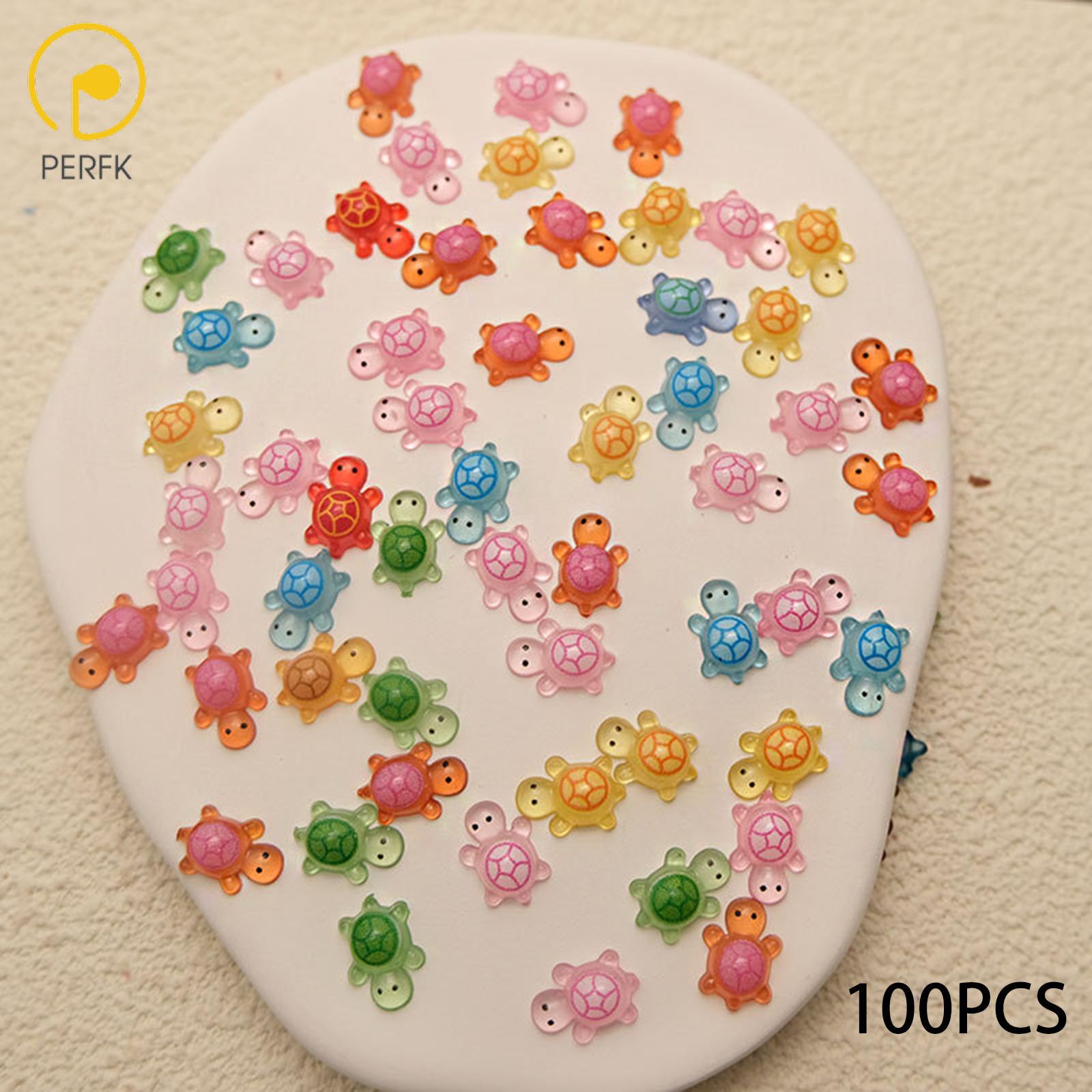 Perfk 100Pcs Luminous Mini Sea Turtles Glow in The Dark Sea Turtles Figurines for DIY Hidded Toppers Garden Decor ราคา 44 บาท*ส่งฟรี