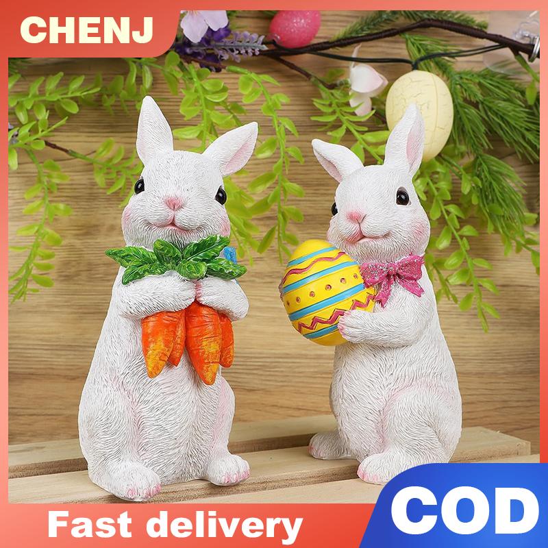 CHENJ ของตกแต่งรูปกระต่ายอีสเตอร์รูปปั้นกระต่ายสีขาวทำจากเรซินแบบตั้งฤดูใบไม้ผลิของตกแต่งโต๊ะของขวัญงานเทศกาลสำหรับสวนบ้าน ราคา 163 บาท*ส่งฟรี