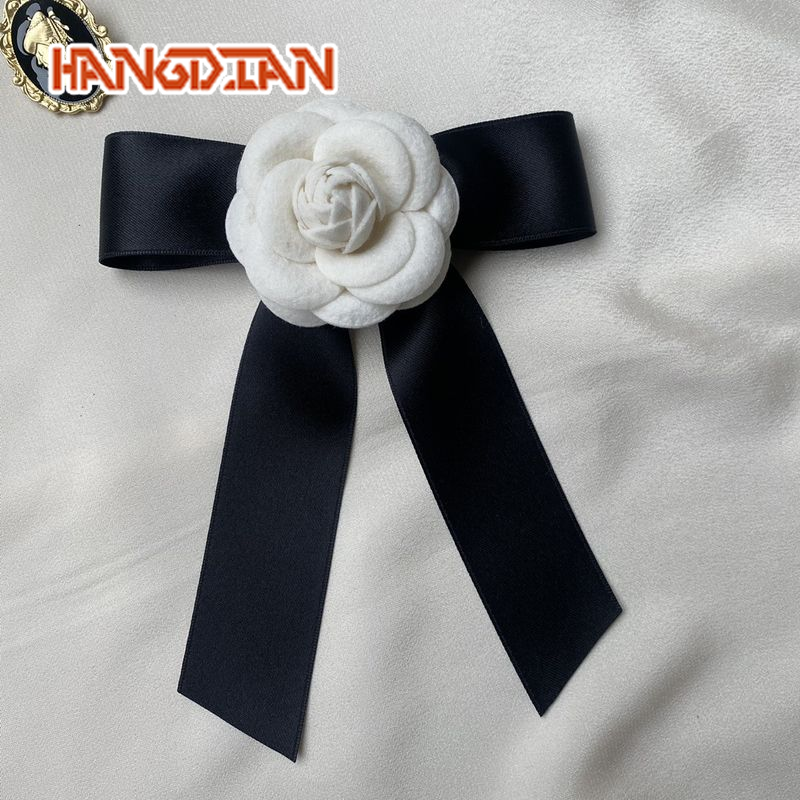 HANGDIAN Elegant Handmade Camellia Flower Brooch with Satin Bow, Vintage Chic Pin for Women's Fashion ราคา 53 บาท*ส่งฟรี