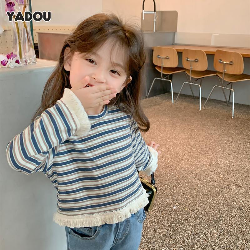 YADOU Children's clothing striped long sleeves cute baby girl T-shirt cuffs and hem tassel design versatile girl T-shirt ราคา 119 บาท*ส่งฟรี