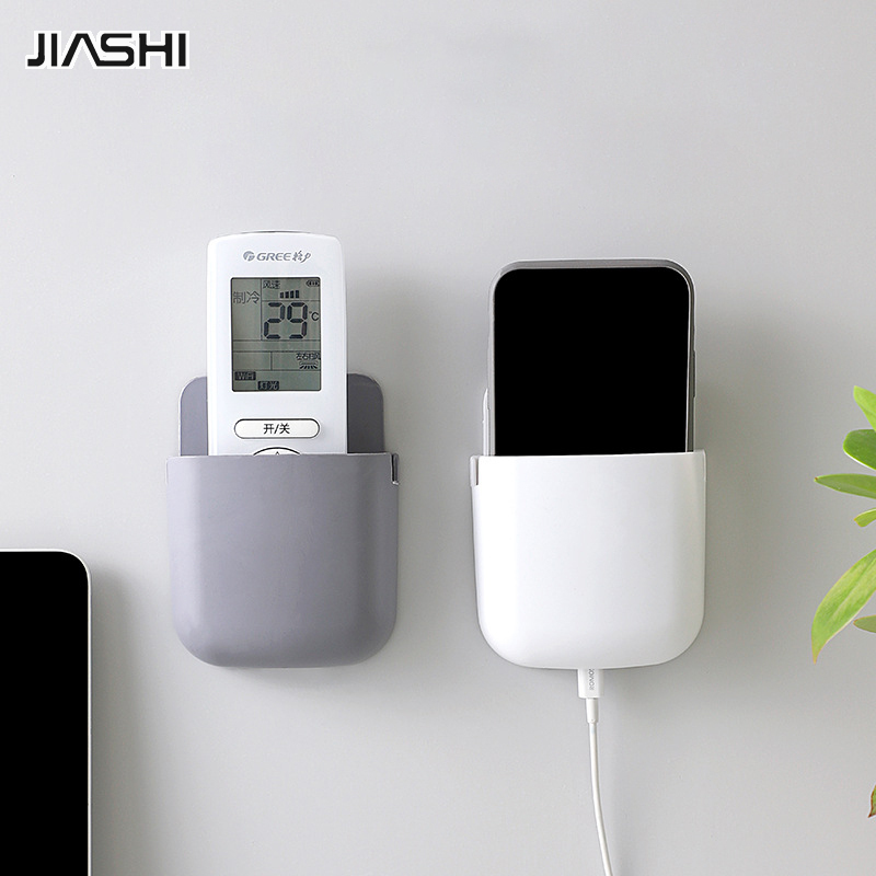 TV air conditioner remote control wall hanging box wall mounted storage box multi-function punch-free mobile phone storage rack ราคา 17 บาท*ส่งฟรี