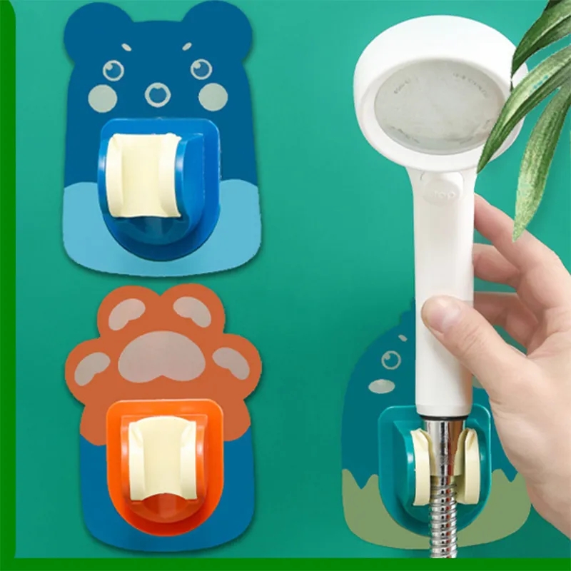 Phổ có thể điều chỉnh giá đỡ vòi hoa sen móc tự dính vòi phun nước chủ phòng tắm phim hoạt hình treo đứng