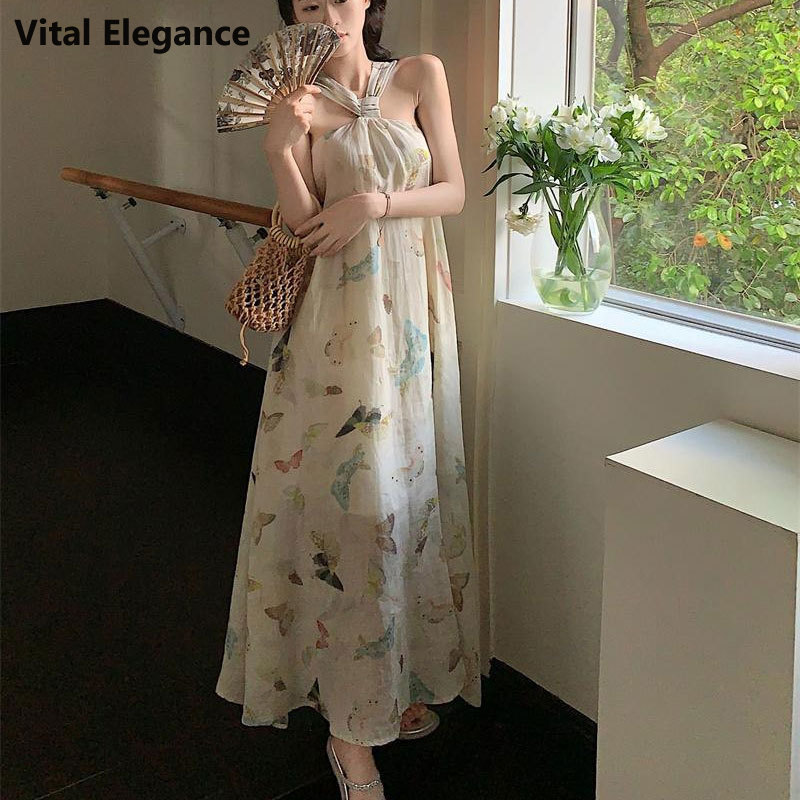 Vital Elegance Guima French halterneck sleeveless dress New bow suspender skirt temperament loose beautiful back skirt ราคา 147 บาท*ส่งฟรี