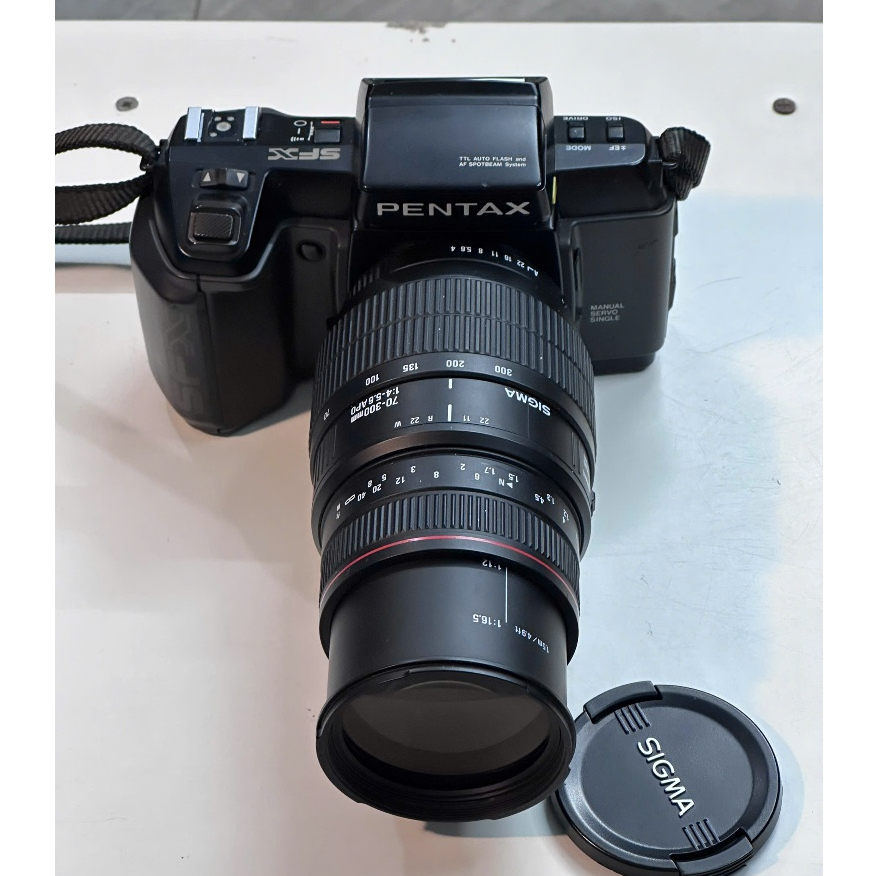 Máy ảnh phim Pentax SFX + lens sigma 70-300mm APO (Ngoài hình mới đẹp - hoạt động tốt) Bảo hành 3 tháng