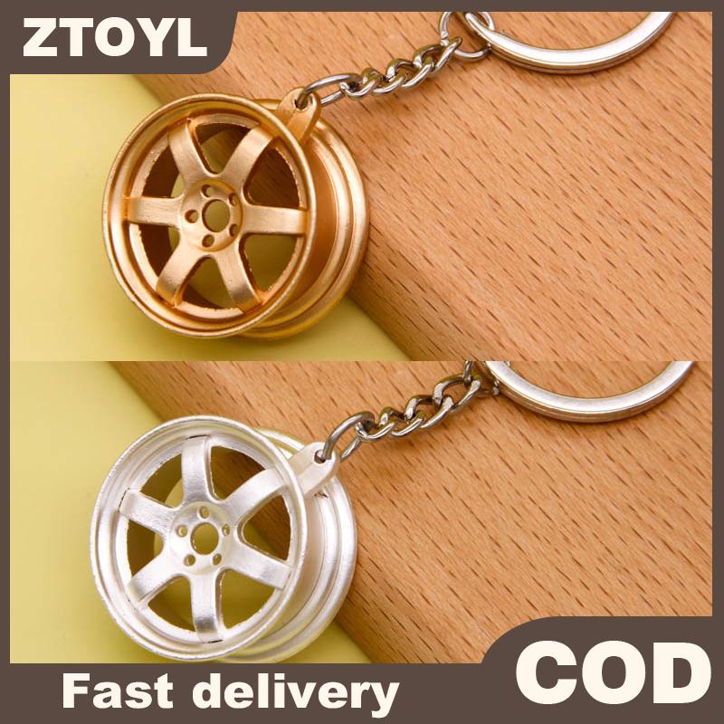 ZTOYL Xe sửa đổi Hub Keychain Hướng dẫn sử dụng đòn bẩy xe kim loại Keychain Turbo bánh Mặt dây chuyền Giá 19,413 Đồng*Miễn phí vận chuyển