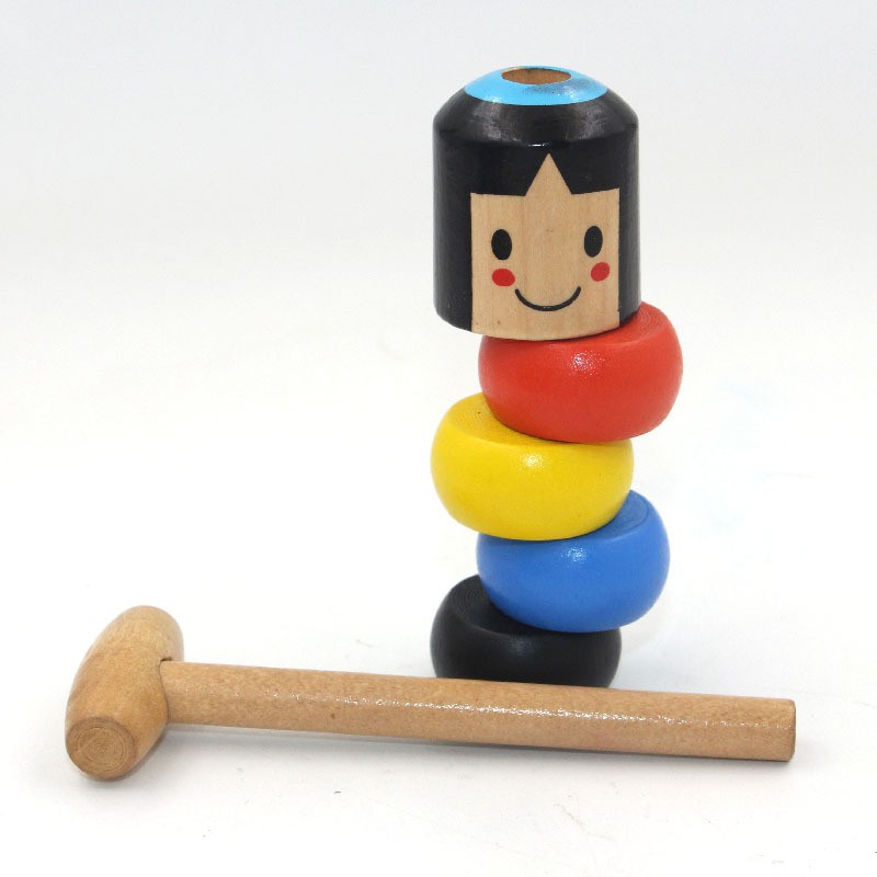 The little wooden man who can t beat the magic tumbler